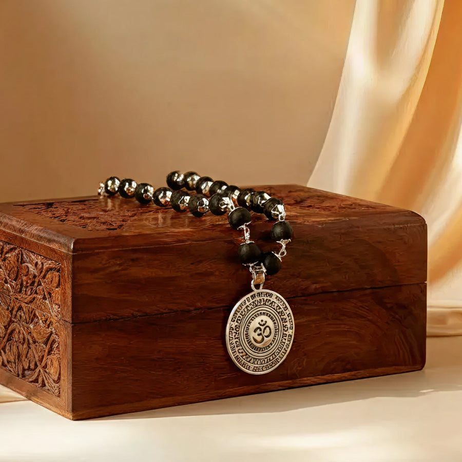 Karungali Silver Cap Mala with Om Pendant